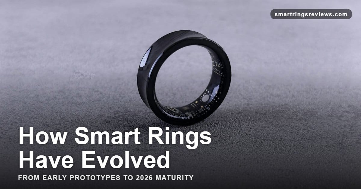 A modern black smart ring with visible circuitry on a textured concrete surface, illustrating the evolution of smart ring technology